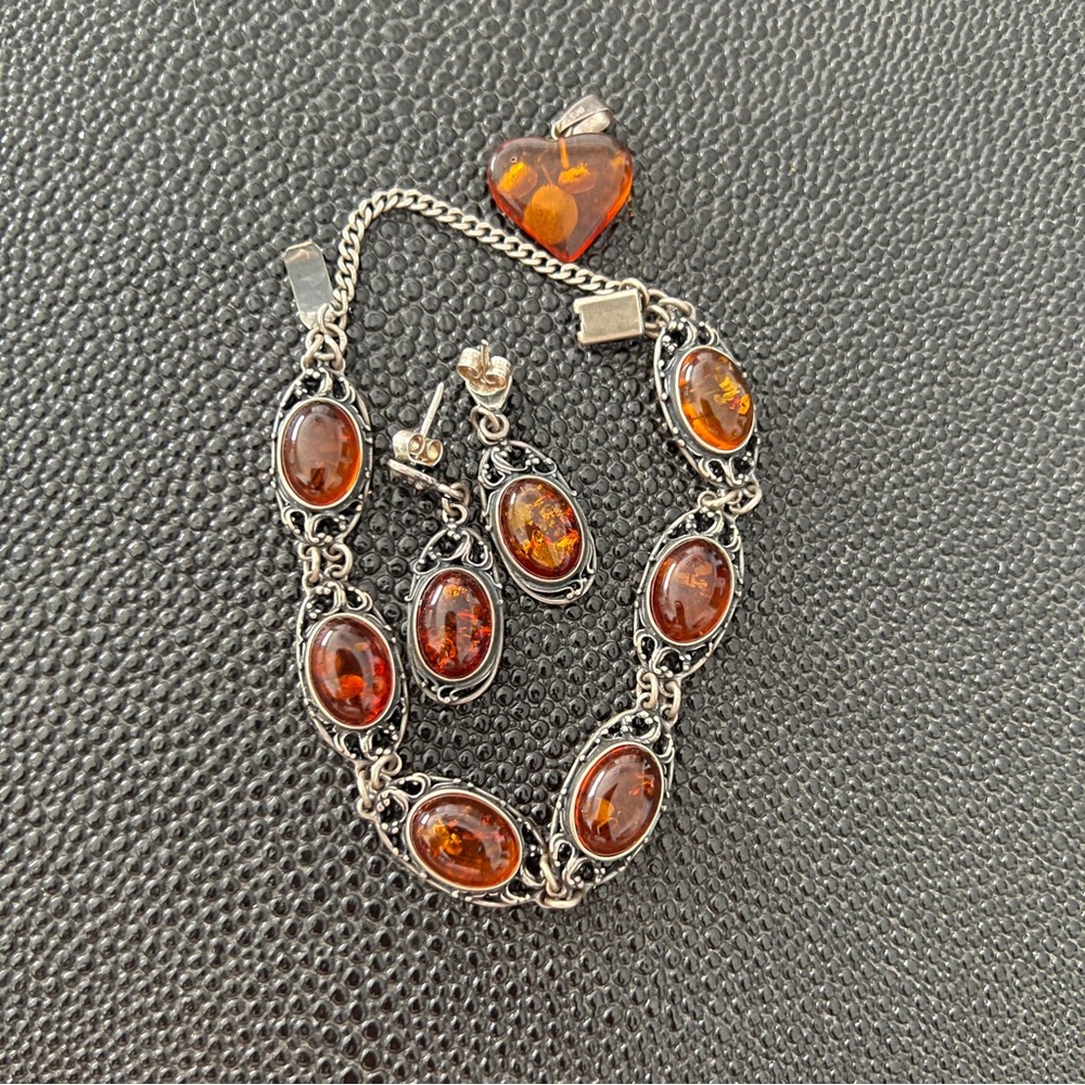 Sterling silver w/Amber set.